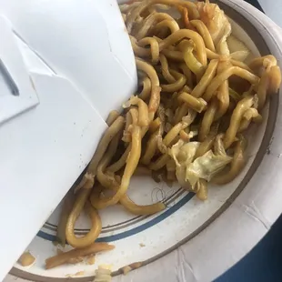 a plate of noodles on a table
