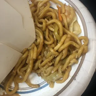 a plate of noodles and a fork