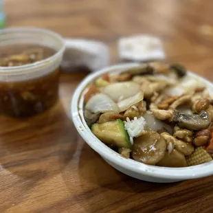 Kung Pao chicken over steamed rice with hot and sour soup- great serving size and price for a lunch meal.