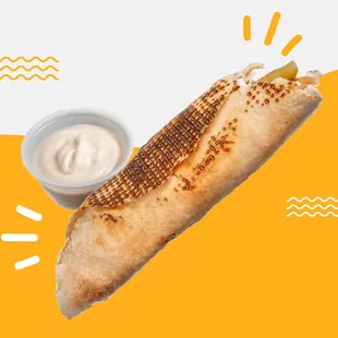 Shawarma sandwich ( Grilled, fluffy chicken topped with creamy garlic sauce and fresh lettuce wrapped in pita bread).