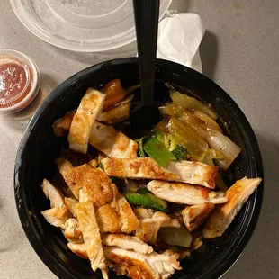 a bowl of chicken and vegetables