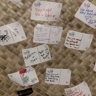 a wall covered in sticky notes