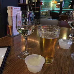 Barefoot Chardonnay in Puck Pond Vineyard glasses . With a side of frozen margarita shot for $2. 3 pool tables too.