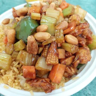 a plate of food with rice and vegetables