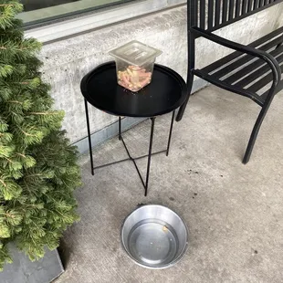 Dog treats + water bowl outside (&apos;: