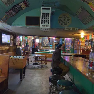 a man sitting at the bar