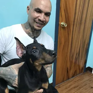 Happy client with his Dobie's ear crop