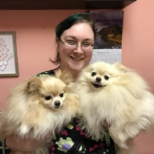 Jessica, one of our groomers is seen here with 2 of our favorites.