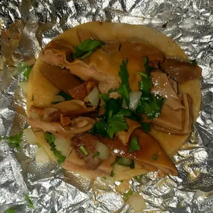 WTH THIS IS A SO CALLED TACO DE ???????? OH YEAH ITS BUCHE  I THINK