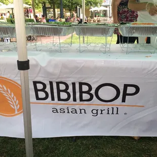 Bibibop proudly displays Yelp signs and their own restaurant sign.