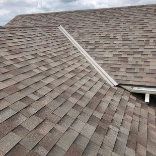 Residential Roof Replacement Material: Malarkey Vista AR Color: Natural Wood