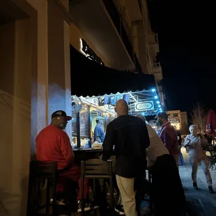 people sitting at a bar