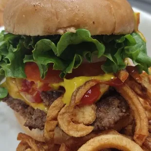 Double cheeseburger and curly fries.