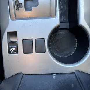 More of the center console that doesn&apos;t even look like it got cleaned.