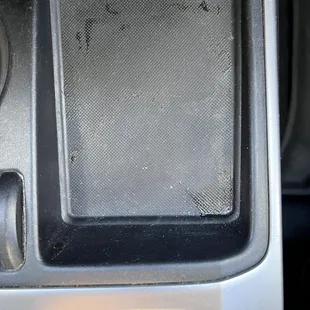 Center console that very clearly was not cleaned well at all.