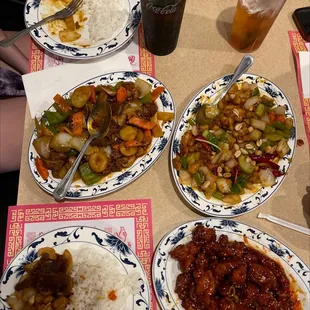 four plates of food on a table