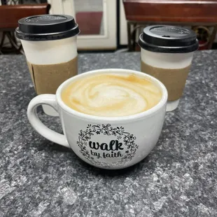 two cups of coffee on a table