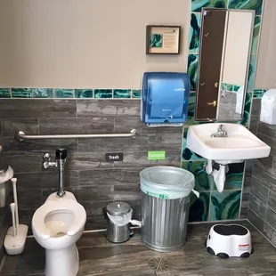 The bathrooms are freakin' gorgeous with their local tile art