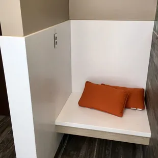 The little sitting area in the family bathroom! A nursing station I assume?!! And with pillows and a plug in for moms who pump!