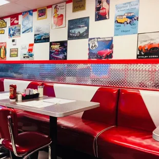 red booths and checkered floor