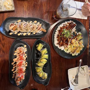 The caterpillar roll, Booty booty, teriyaki bowl, and the nude - our Philly roll came out later.