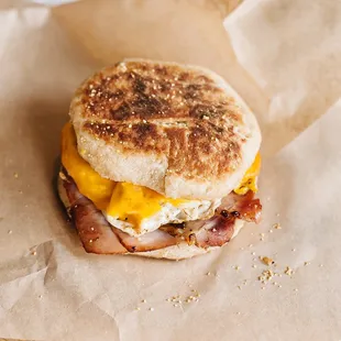 From scratch English muffins, baked in house, with house smoked Canadian bacon, egg, and cheese.