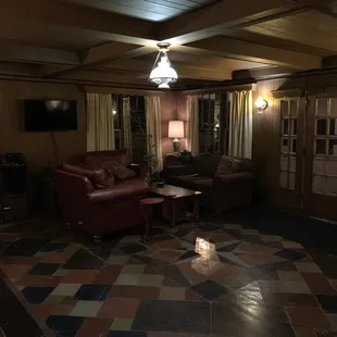 a living room with a tiled floor