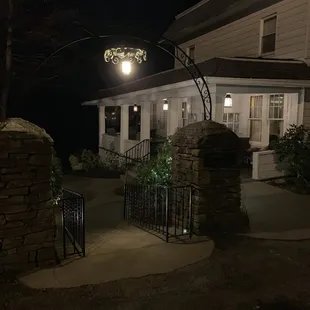 the entrance to a house at night