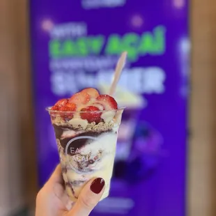 Acai + cupuacu with strawberries, granola, &amp; condensed milk