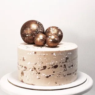 Sponge cake, decorated with chocolate balls
