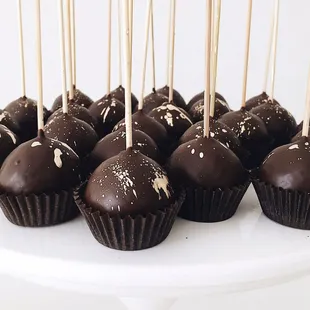 Custom order. Party cake pops, in dark chocolate.
