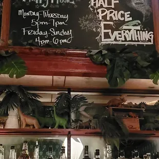 a chalkboard with a price list on it