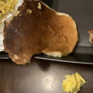 Burnt Pancake Plate they flipped it to show the nicer side