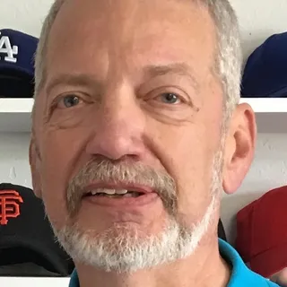 John B.