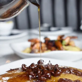 Chocolate chip pancakes and shrimp and grits