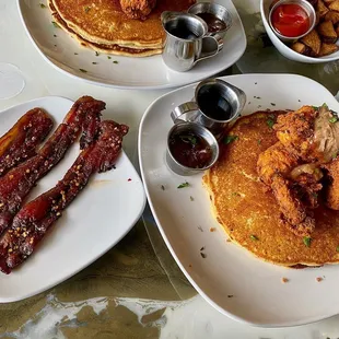 Buttermilk chicken and cornmeal pancakes w/ a side of candied bacon and home fries.