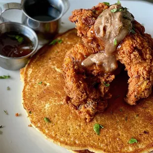 Buttermilk chicken and cornmeal pancakes w/ maple butter, a side of maple syrup and habanero jam.