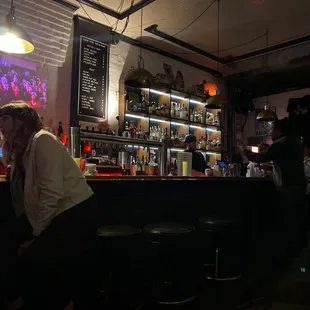 a man sitting at a bar