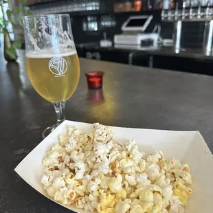 popcorn and a glass of beer