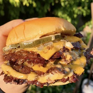 Triple Smash grilled onions and wild sauce