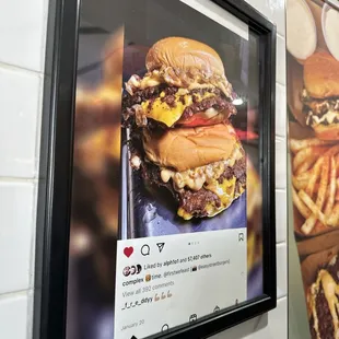 a poster of a hamburger and fries