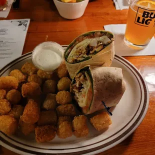 Cajun wrap with Cajun tater tots