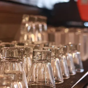 rows of empty wine glasses