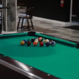 Shoot some pool.