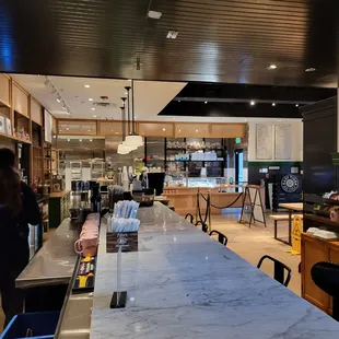 a restaurant with a marble counter top