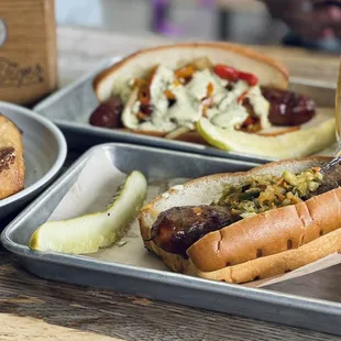 a hot dog, french fries, and pickles