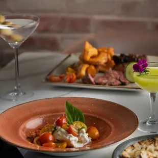 a plate of food and a drink