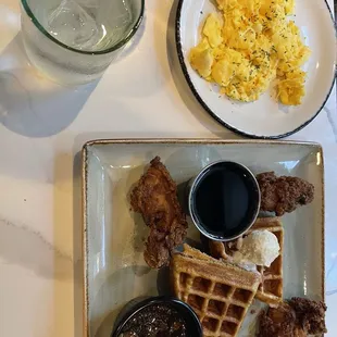 Chicken and waffles with a side of scrambled eggs