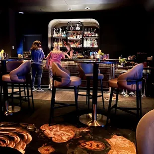 people sitting at the bar