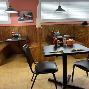 a table and chairs in a restaurant